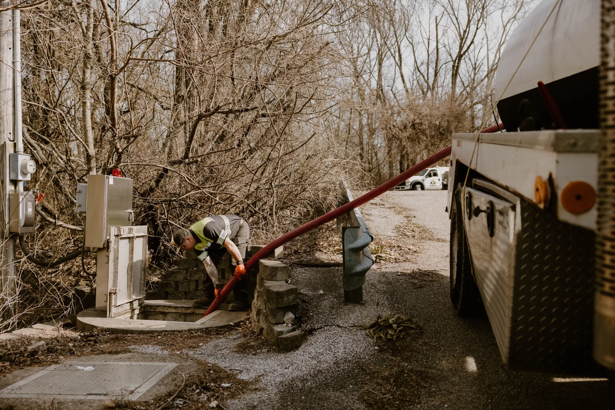 A&A Quick Pumping Worker Pumping out a lift station